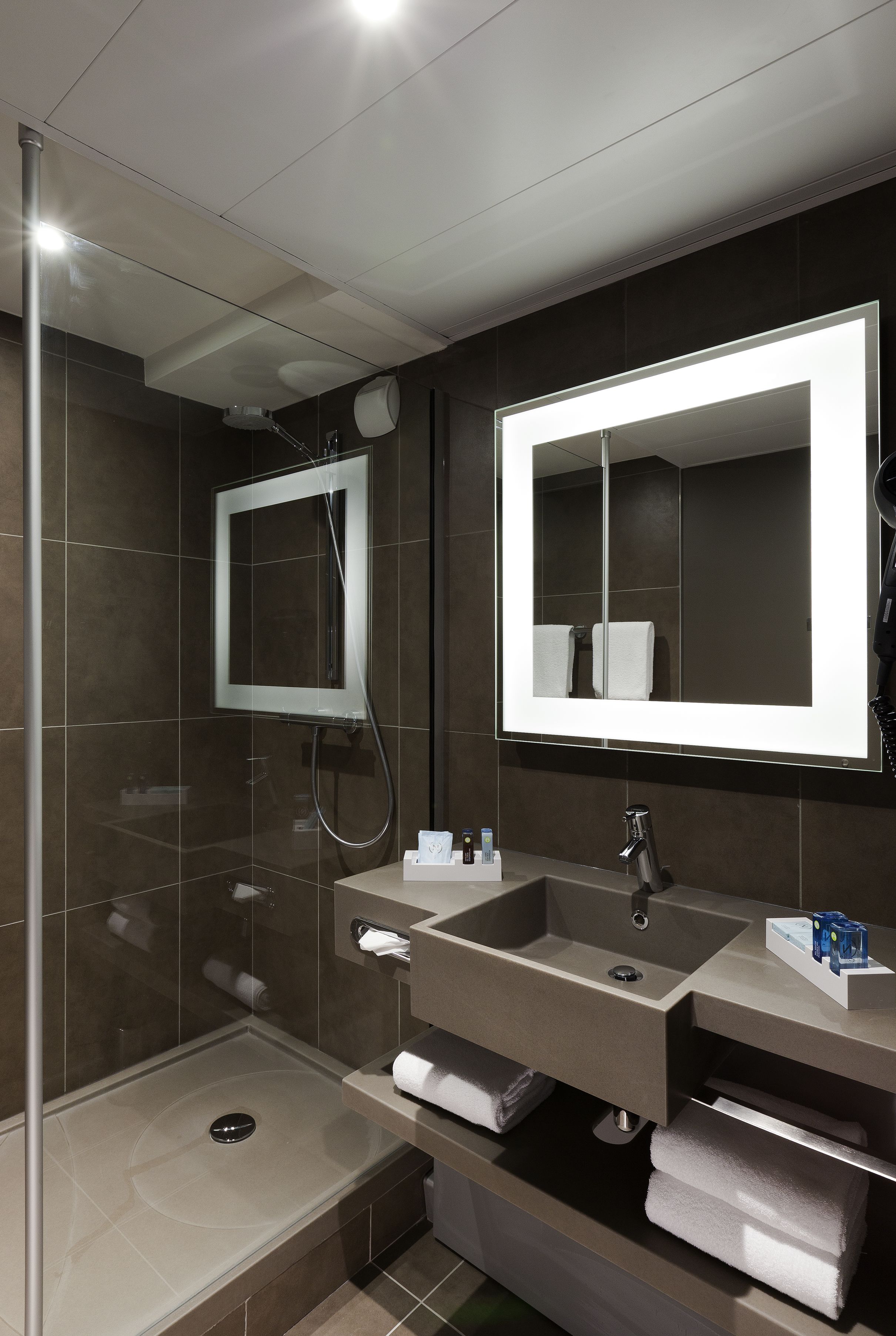 shower, eco-friendly toiletries, hair dryer, towels