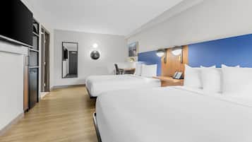 Premium bedding, desk, iron/ironing board, free cots/infant beds