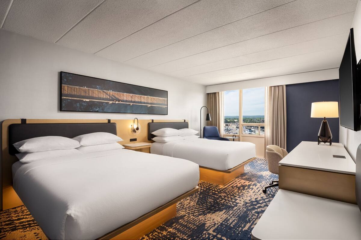Hypo-allergenic bedding, pillow-top beds, desk, laptop workspace
