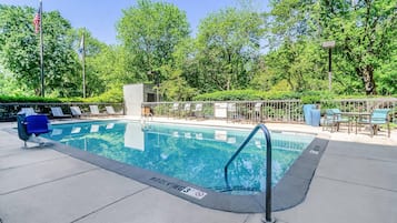 Seasonal outdoor pool, open 10:00 AM to 8:00 PM, pool umbrellas