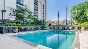 Seasonal outdoor pool, open 10:00 AM to 8:00 PM, pool umbrellas