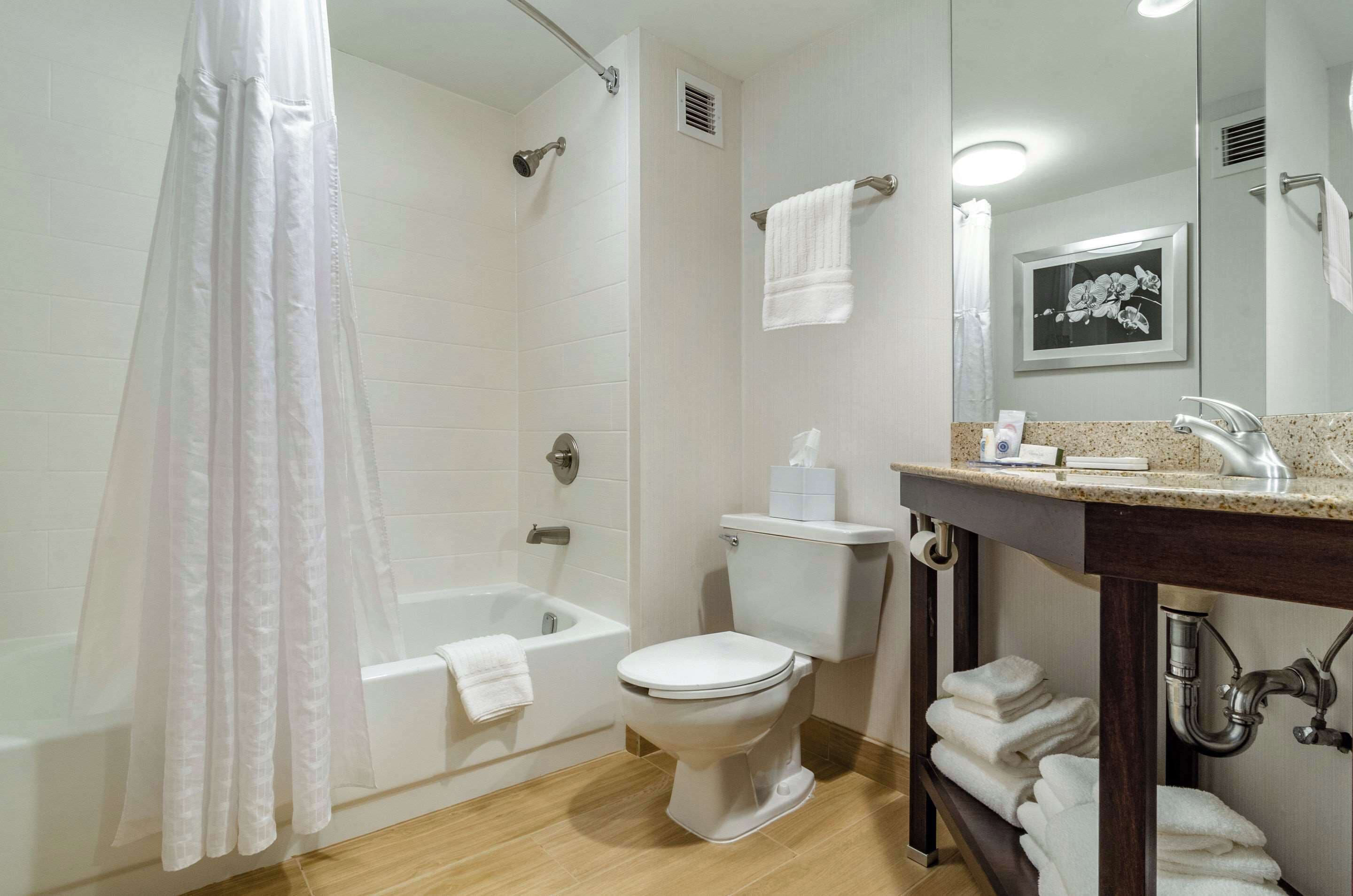 premium bedding, desk, laptop workspace, blackout curtains