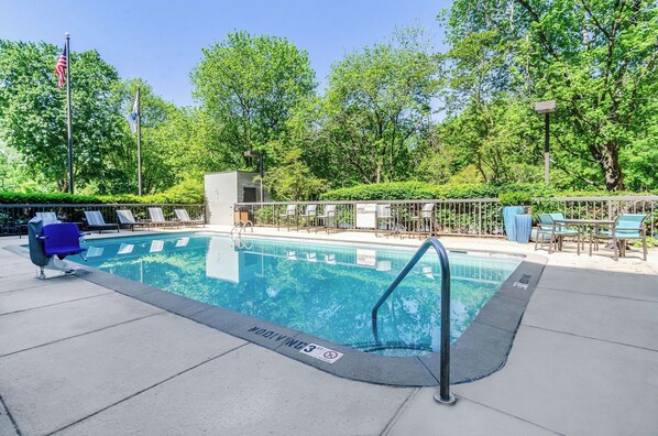 Seasonal outdoor pool, open 10:00 AM to 8:00 PM, pool umbrellas