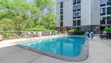 Seasonal outdoor pool, open 10:00 AM to 8:00 PM, pool umbrellas