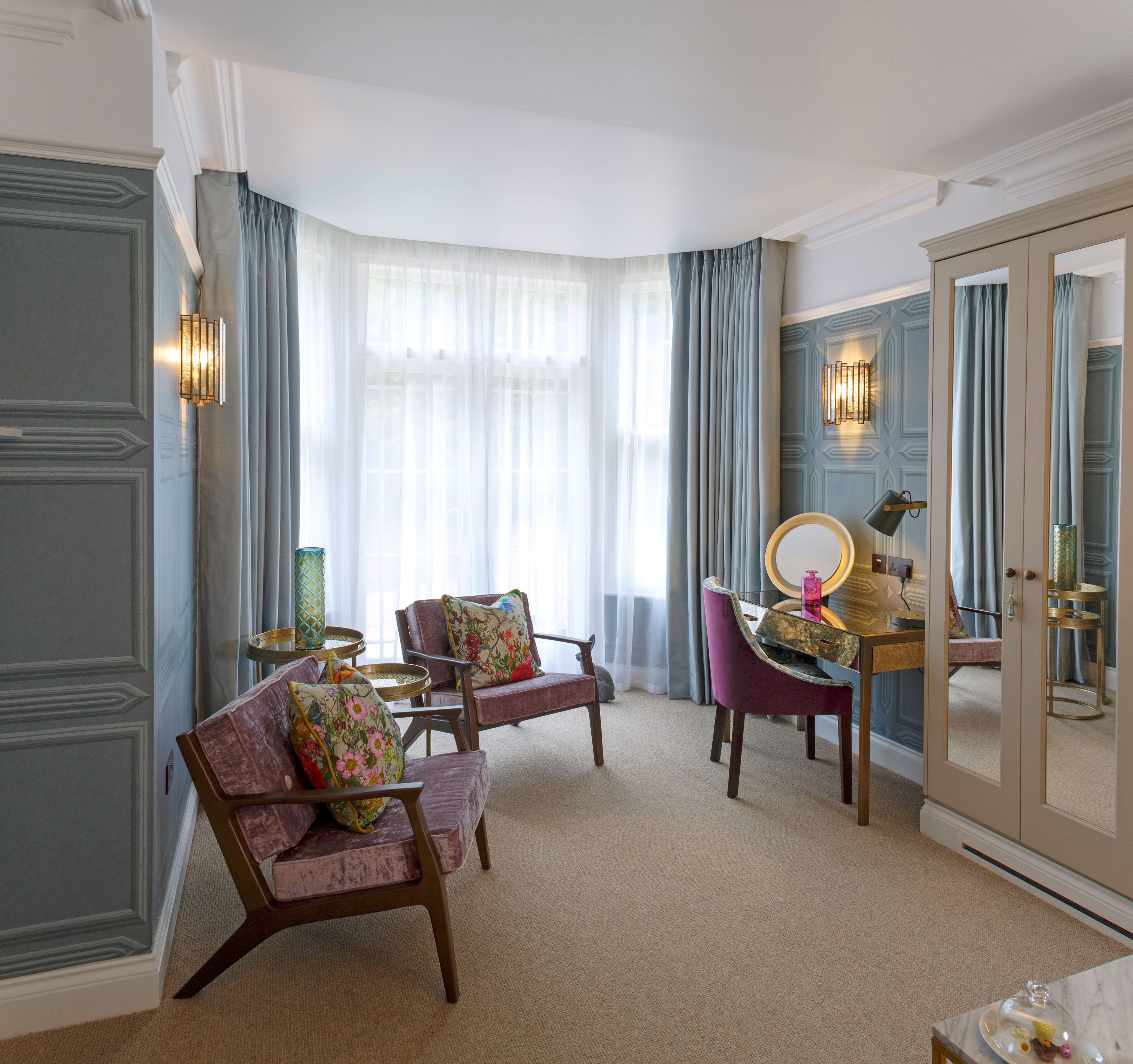 feature room premier | in-room safe, desk, laptop workspace, iron/ironing board