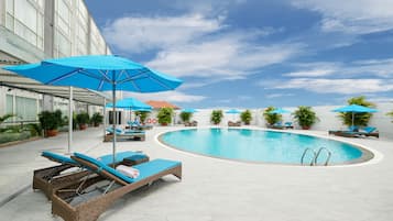 Outdoor pool, pool umbrellas, pool loungers