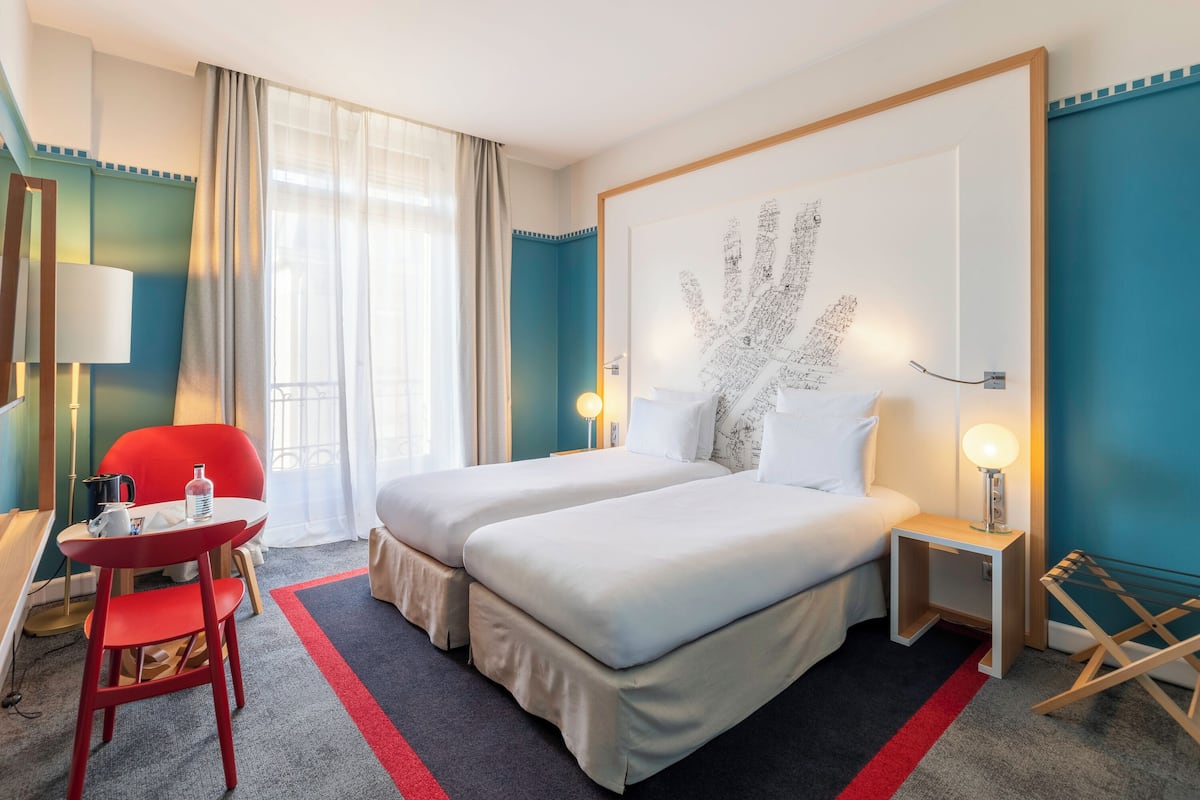 Premium bedding, pillow-top beds, in-room safe, blackout curtains