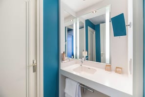 Eco-friendly toiletries, hair dryer, towels, soap