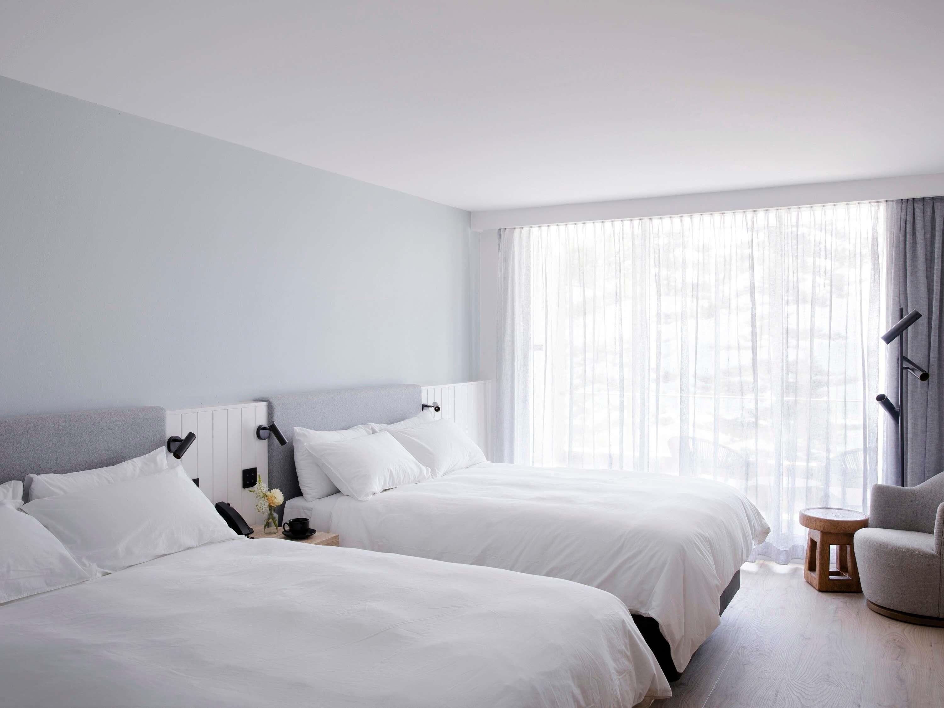 Deluxe Room, 2 Queen Beds, Ocean View | Pillowtop beds, minibar, in-room safe, laptop workspace