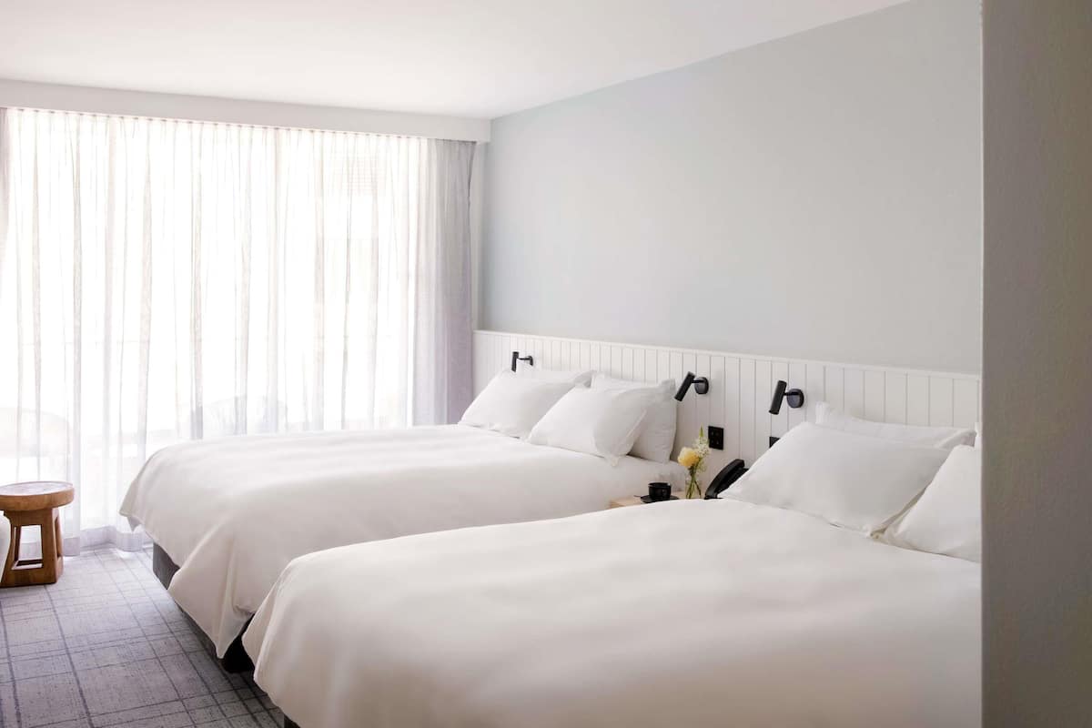 Pillow-top beds, minibar, in-room safe, laptop workspace