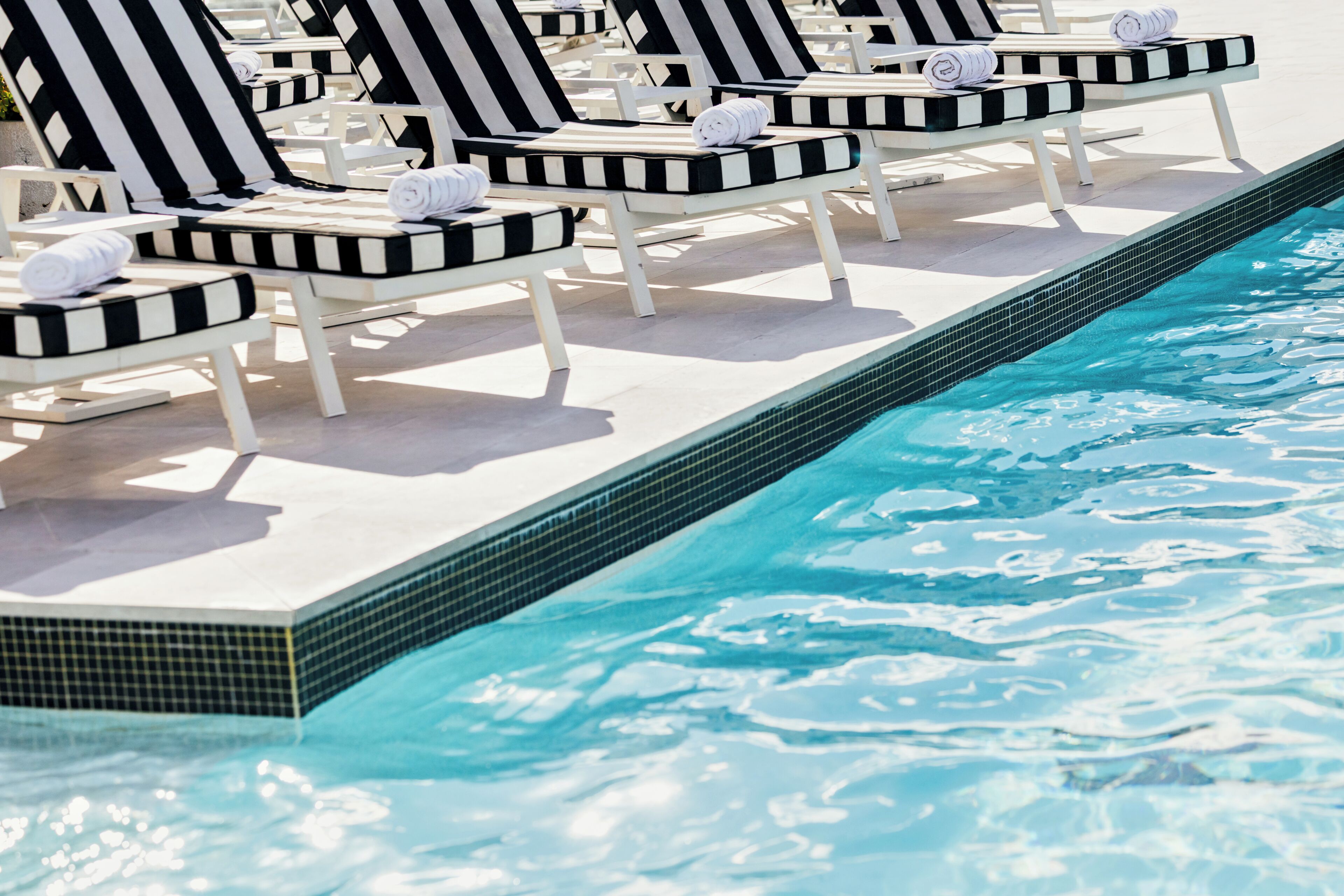 Outdoor pool, pool umbrellas, pool loungers