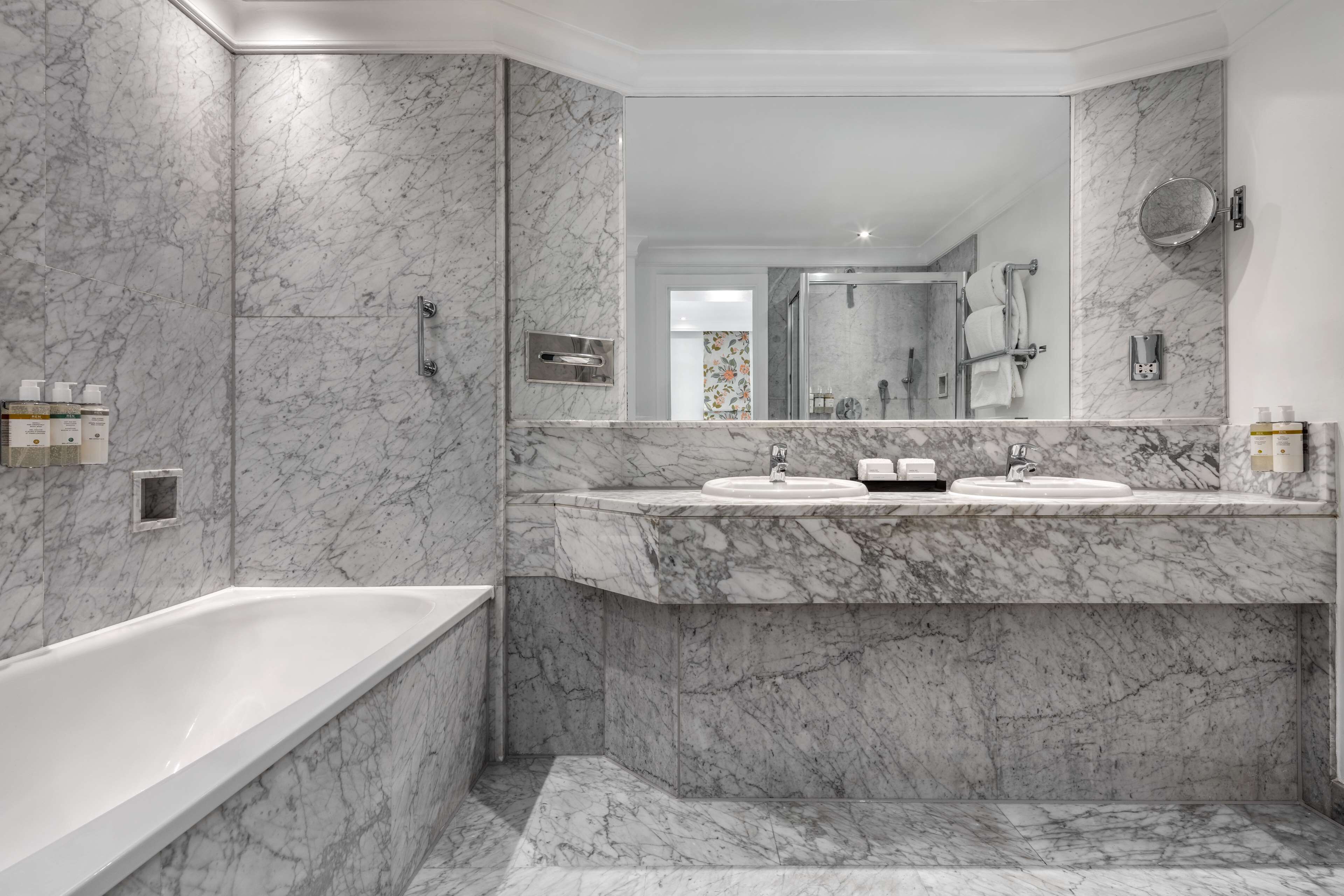 junior suite | bathroom | shower, designer toiletries, hair dryer, towels