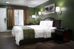 Standard Room, 1 King Bed, Smoking | Premium bedding, in-room safe, laptop workspace, blackout drapes