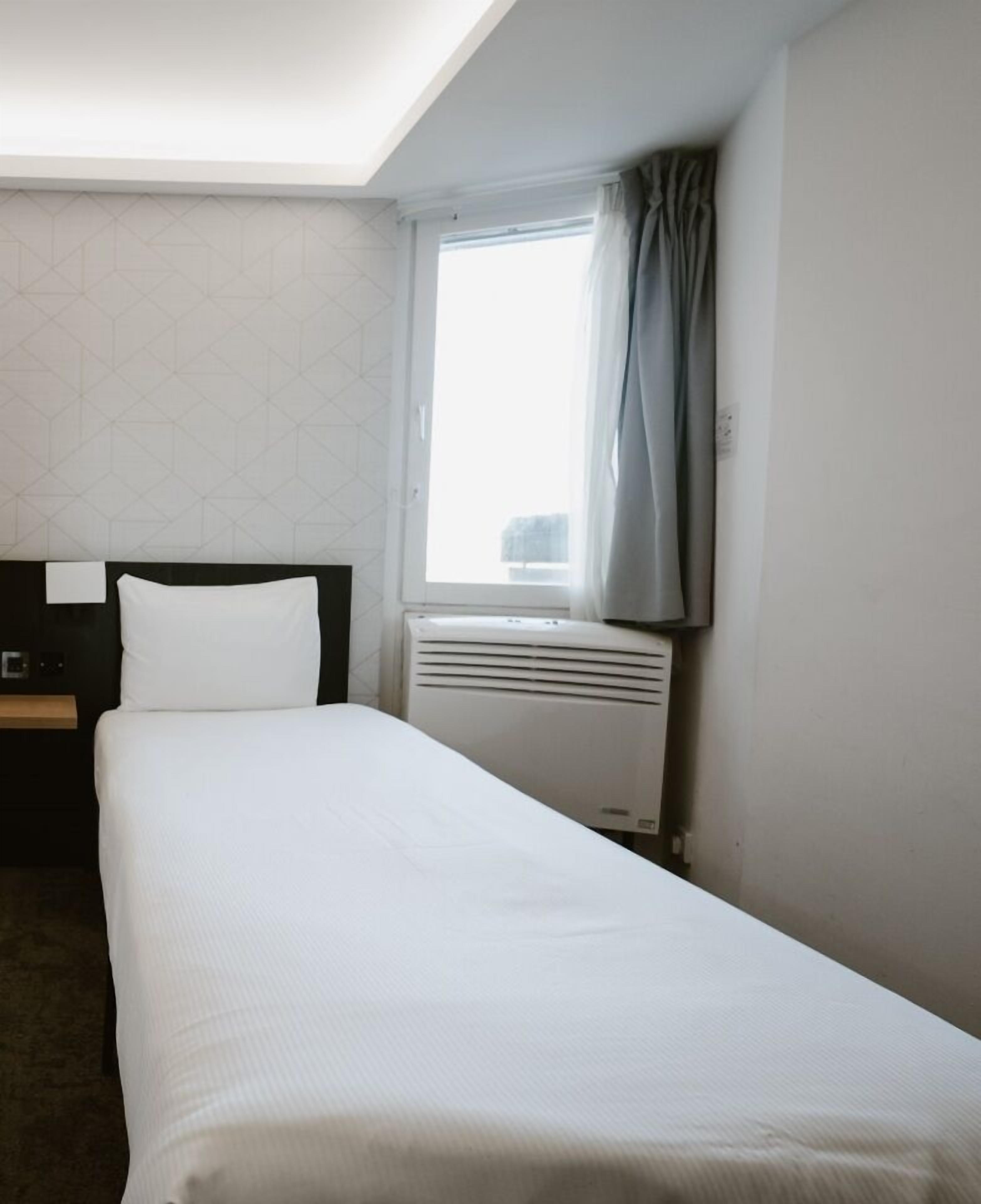 Habitación (Urban Solo) | Caja fuerte, escritorio, wifi gratis y ropa de cama