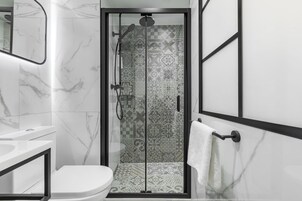 Shower, eco-friendly toiletries, hair dryer, towels