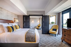 Signature Suite, 1 King Bed, Hot Tub (Warwick) | Minibar, in-room safe, desk, laptop workspace