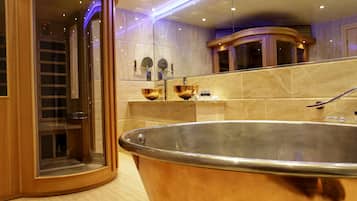 Suite, 1 King Bed, Sauna, Garden View (Four Poster Bed) | Bathroom | Hydromassage showerhead, eco-friendly toiletries, hair dryer, bathrobes