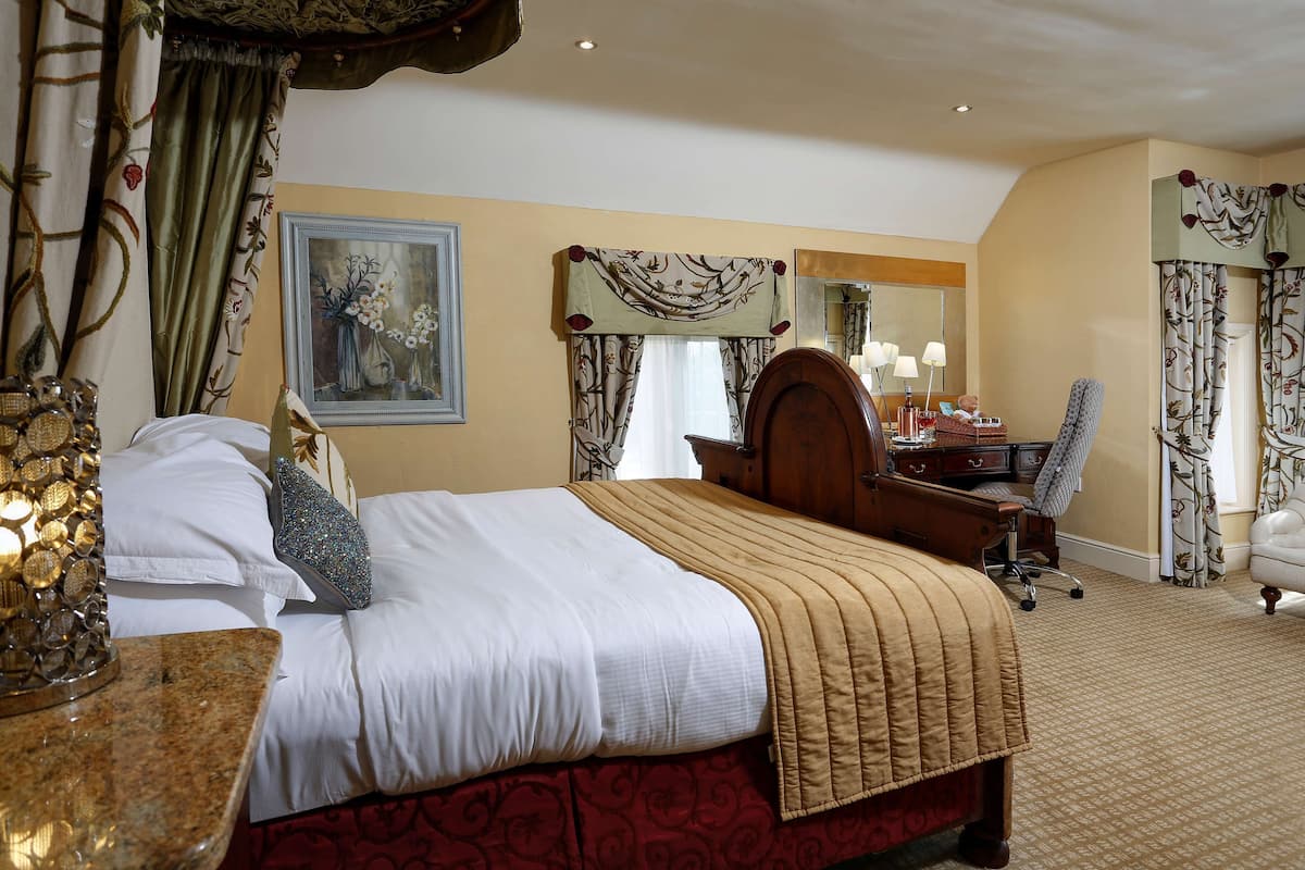 Suite, 1 King-Bett | Hochwertige Bettwaren, Zimmersafe, individuell dekoriert