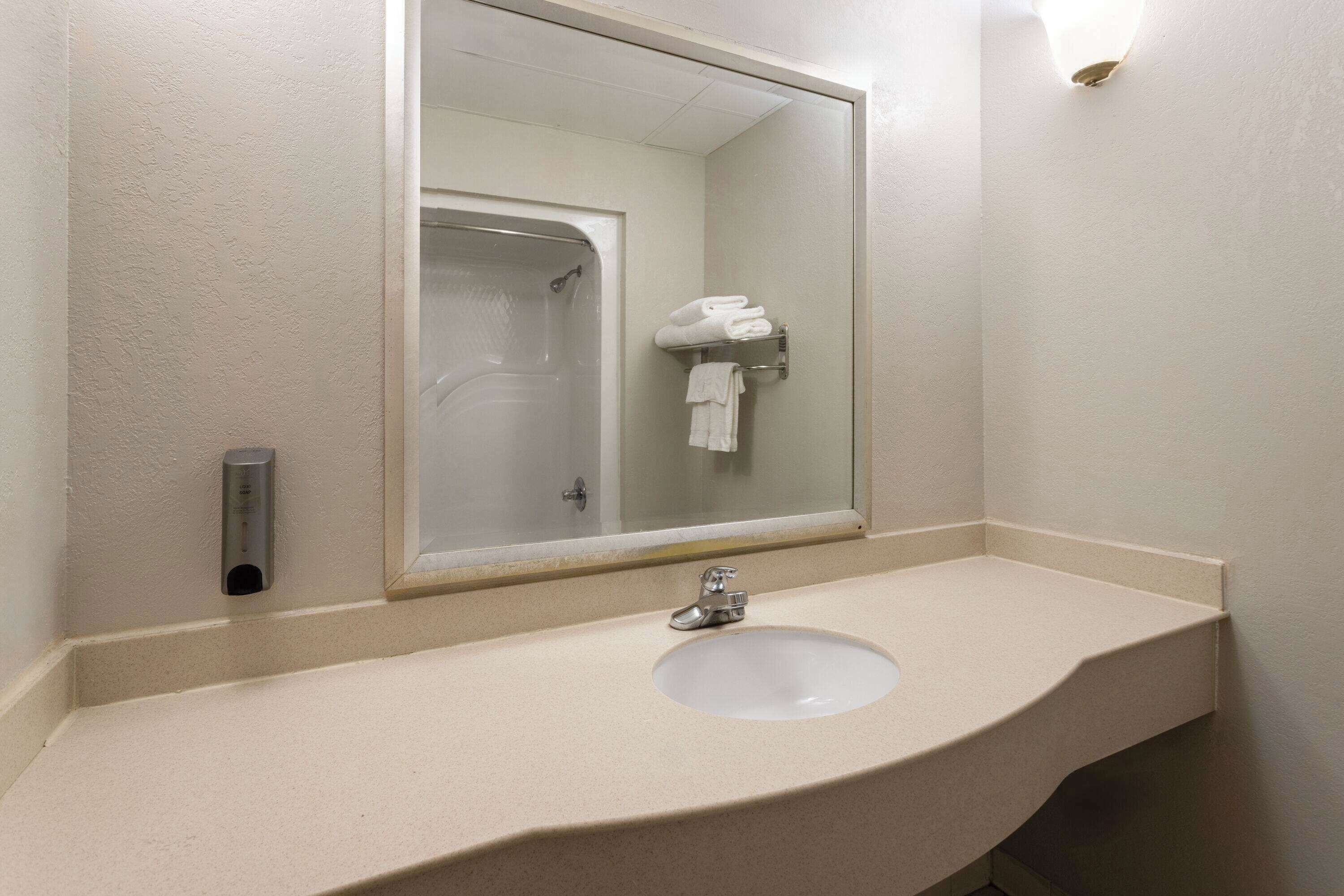Combined shower/tub, eco-friendly toiletries, hair dryer, towels