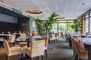 Breakfast, lunch, dinner served; Regional cuisine, garden views 