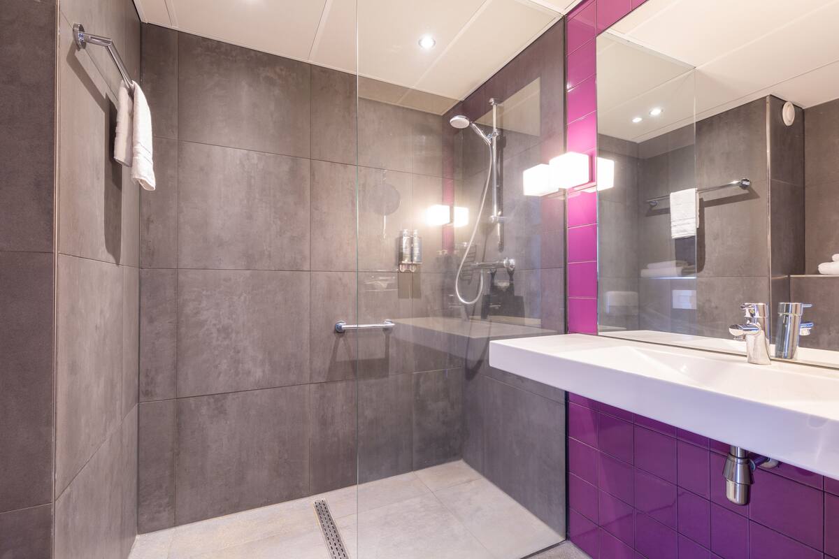 eco-friendly toiletries, hair dryer, bathrobes, towels