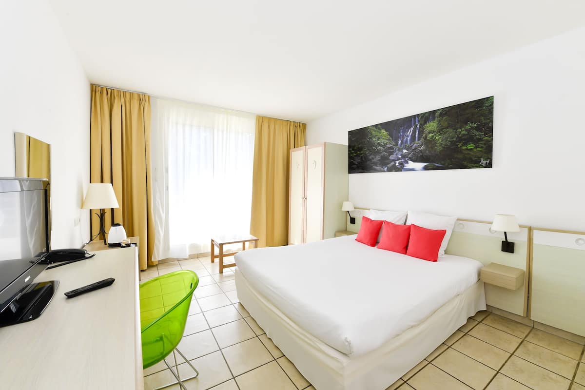 Ropa de cama de alta calidad y minibar
