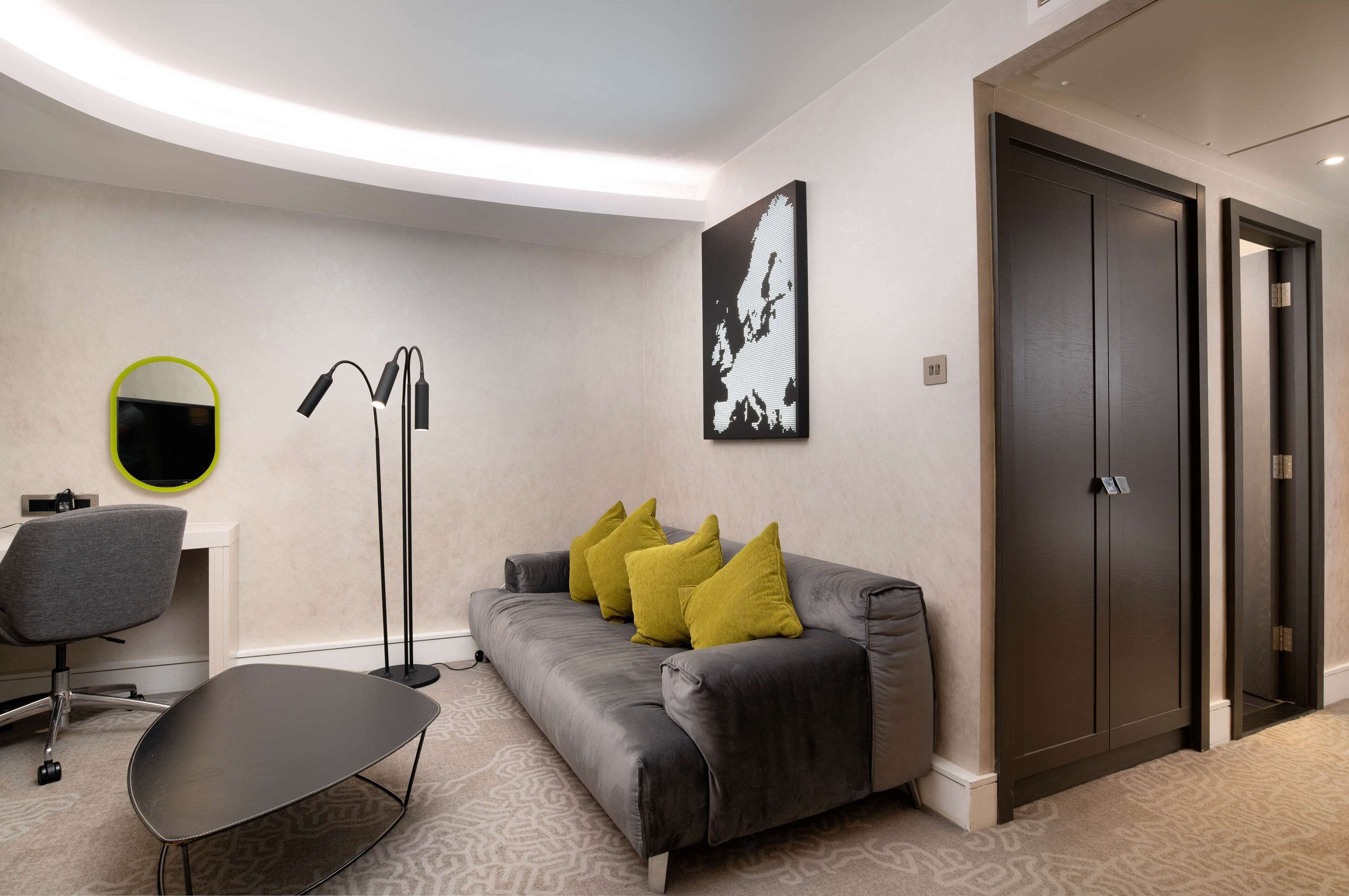 junior suite, 1 king bed (with lounge access) | living area | 50-inch flat-screen tv with satellite channels, tv