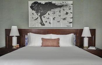 Hotel amenities such as safe, desk and work area at Hotel Emblem San Francisco