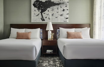 Hotel amenities such as safe, desk and work area at Hotel Emblem San Francisco
