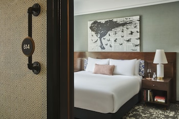 Hotel amenities such as safe, desk and work area at Hotel Emblem San Francisco