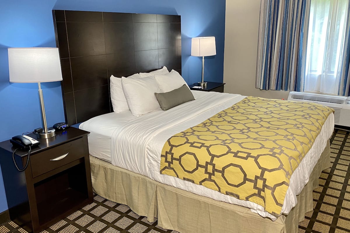 desk, blackout curtains, iron/ironing board, cots/infant beds