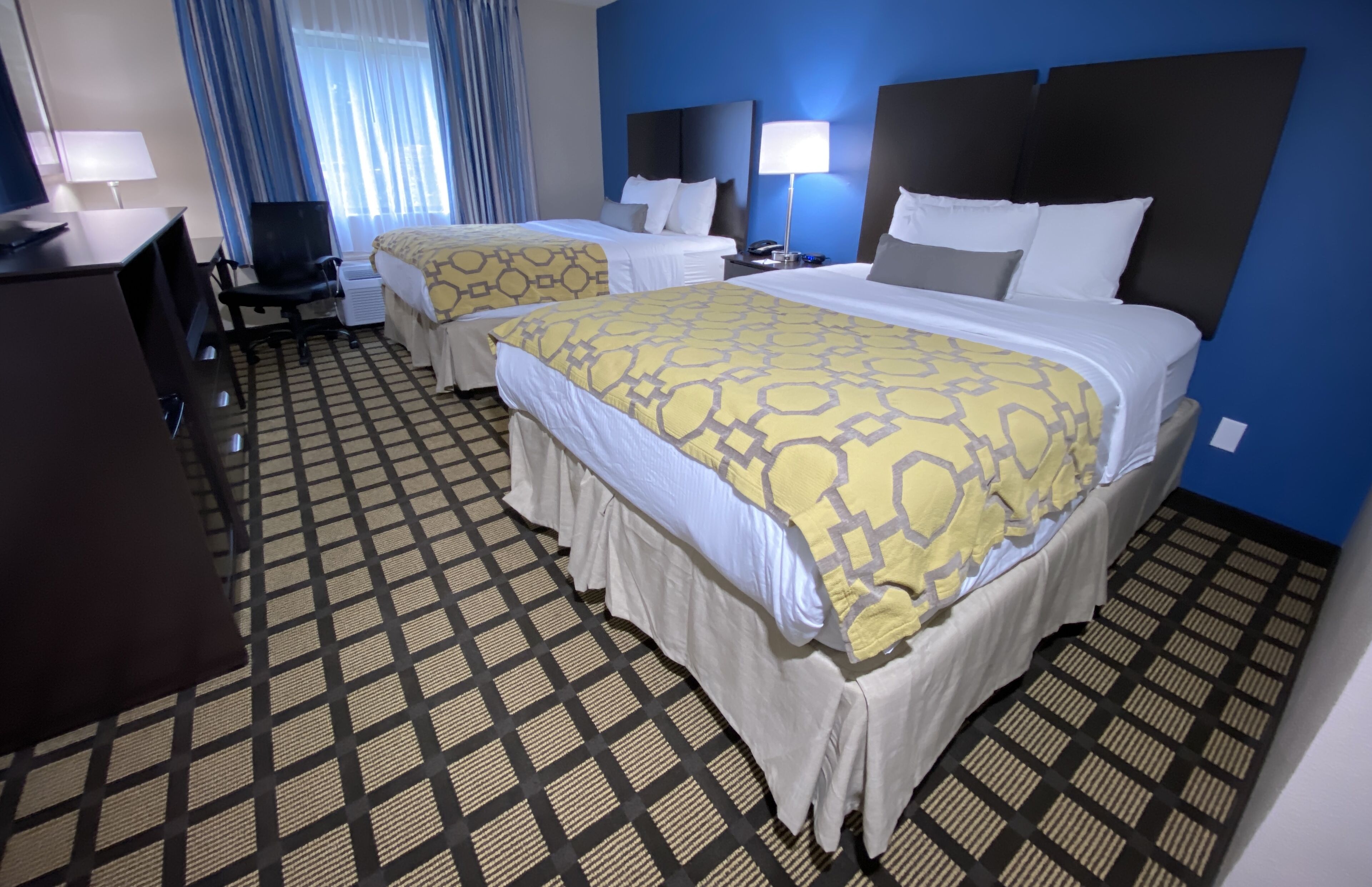 desk, blackout curtains, iron/ironing board, cots/infant beds