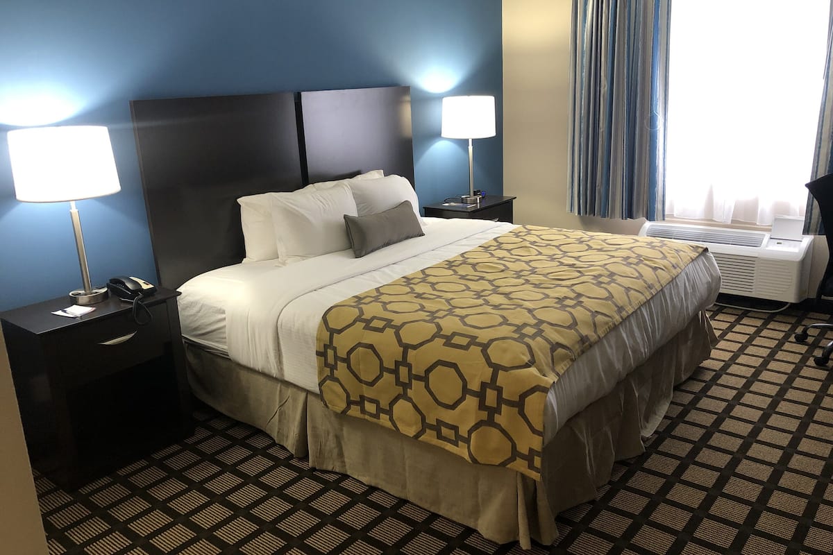 desk, blackout curtains, iron/ironing board, cots/infant beds