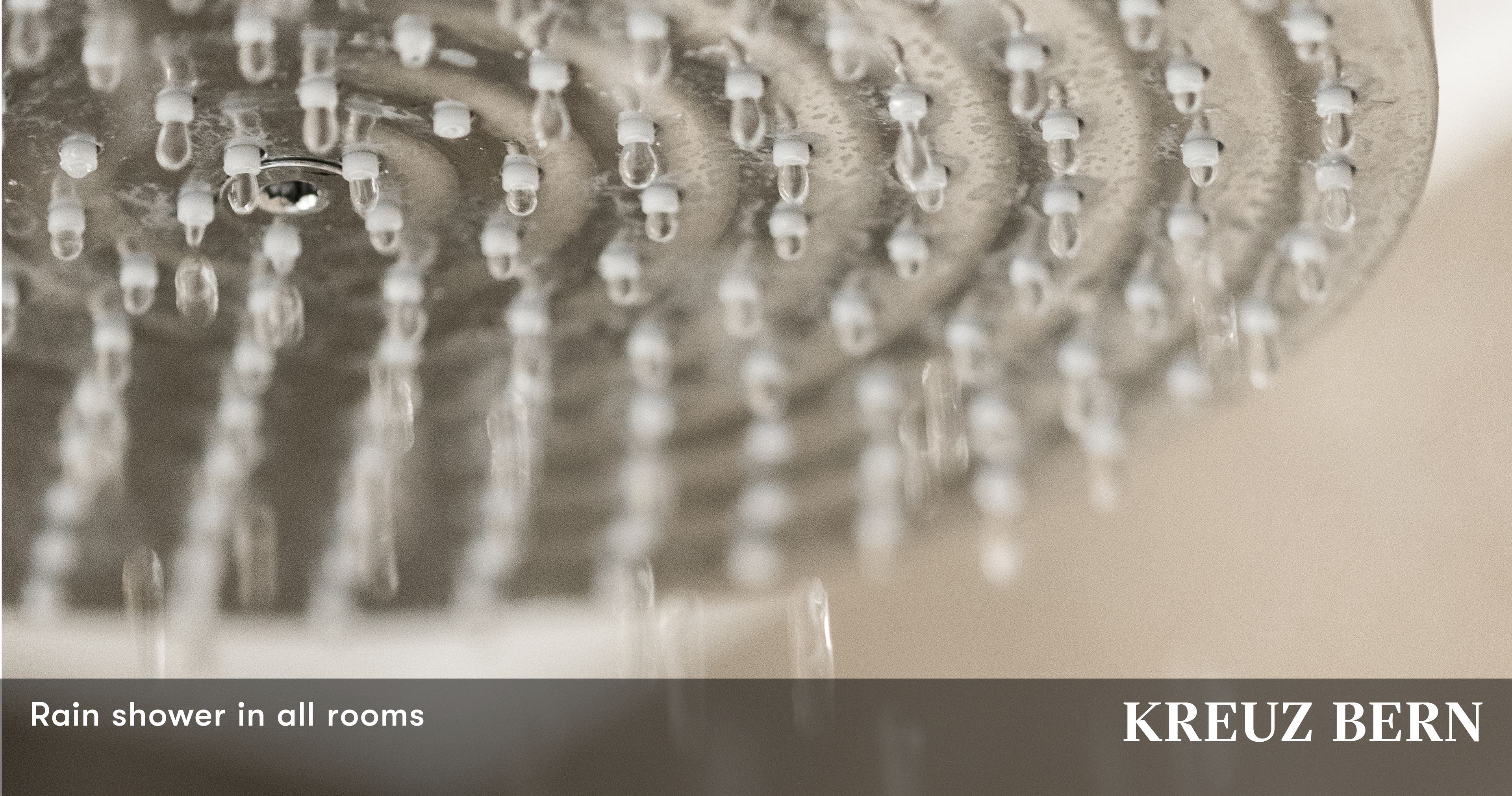 A rain shower head in a bathroom.