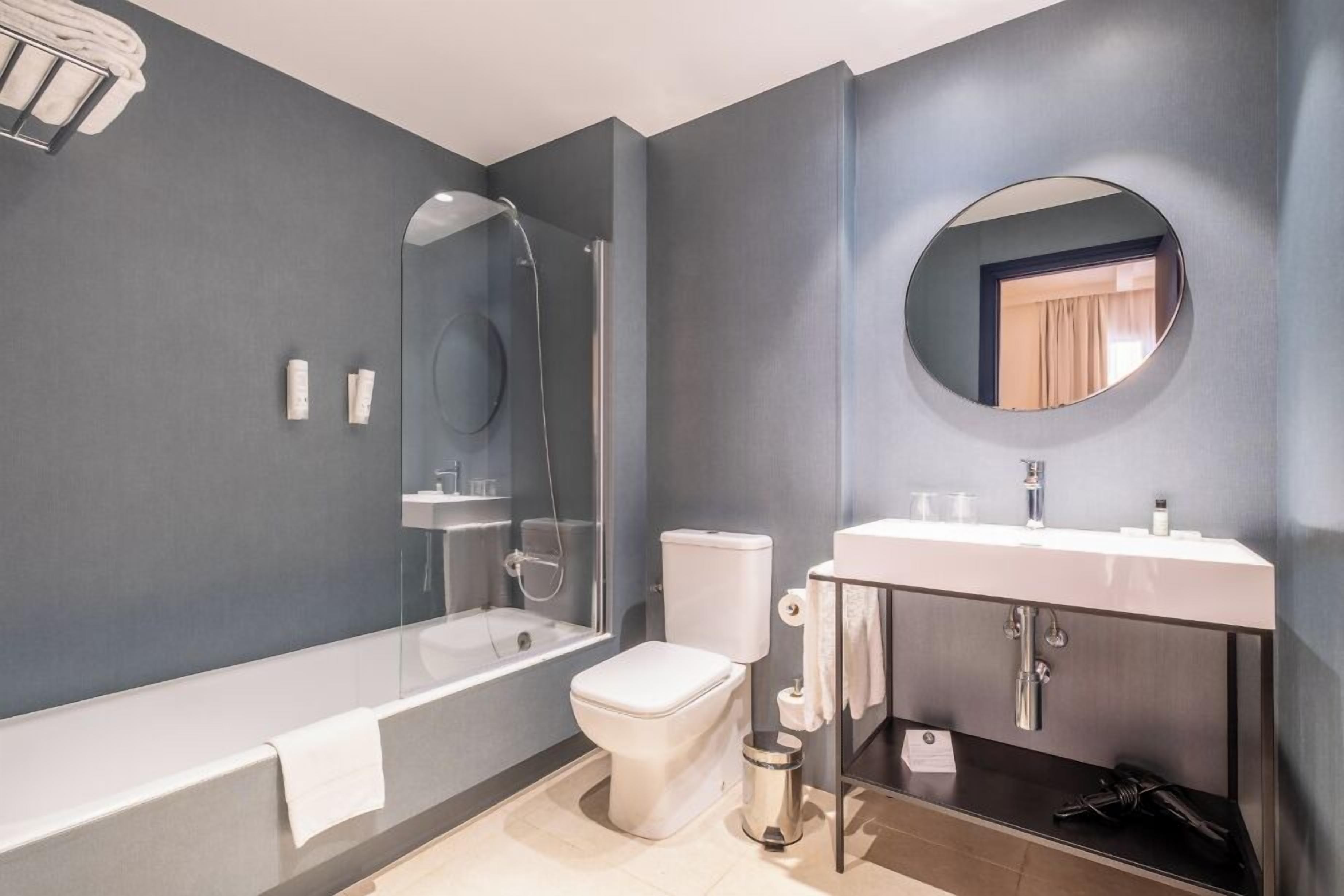 free toiletries, hair dryer, bidet, towels