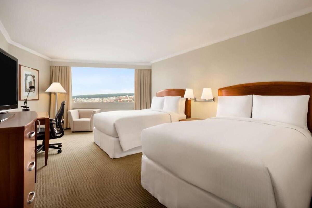 Ropa de cama de alta calidad y minibar