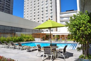 Outdoor pool, pool umbrellas, sun loungers