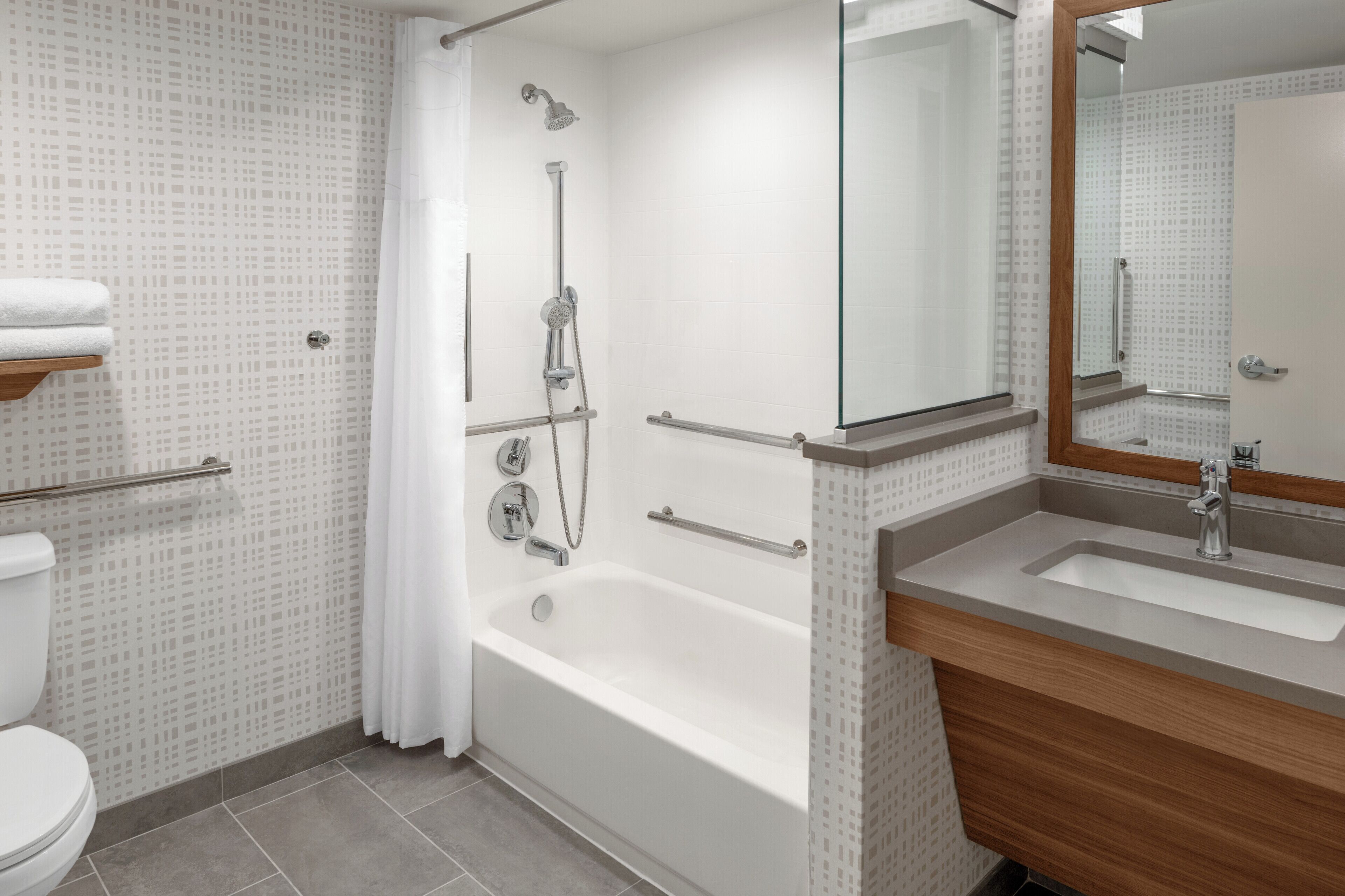 Combined shower/bathtub, eco-friendly toiletries, hair dryer, bathrobes