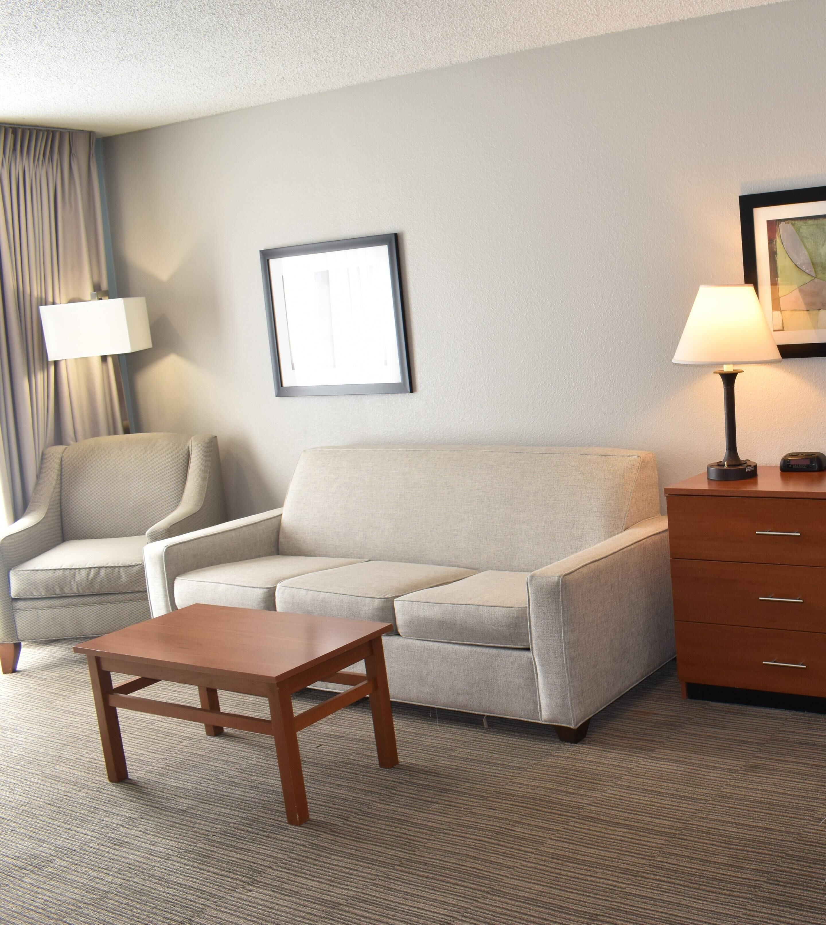 Suite, Multiple Beds, Non Smoking | Desk, laptop workspace, blackout drapes, iron/ironing board