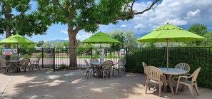 Seasonal outdoor pool, open 9 AM to 10 PM, pool umbrellas