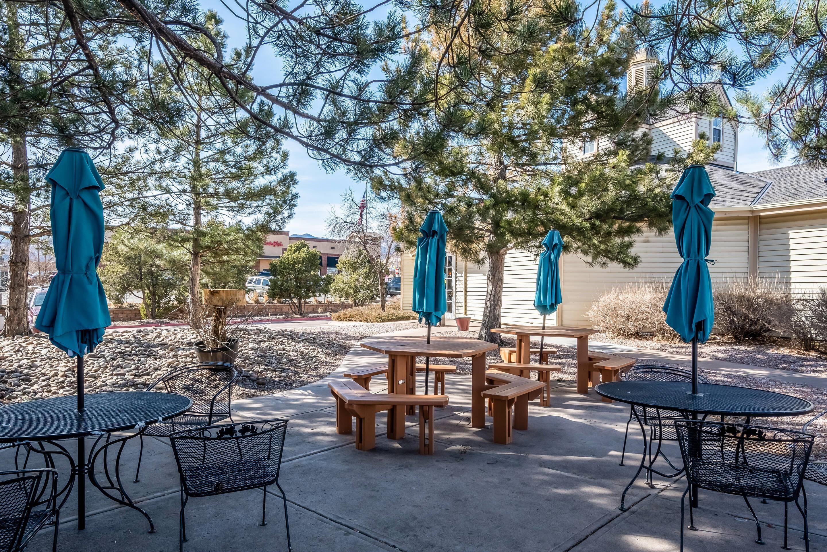 Seasonal outdoor pool, open 9 AM to 10 PM, pool umbrellas