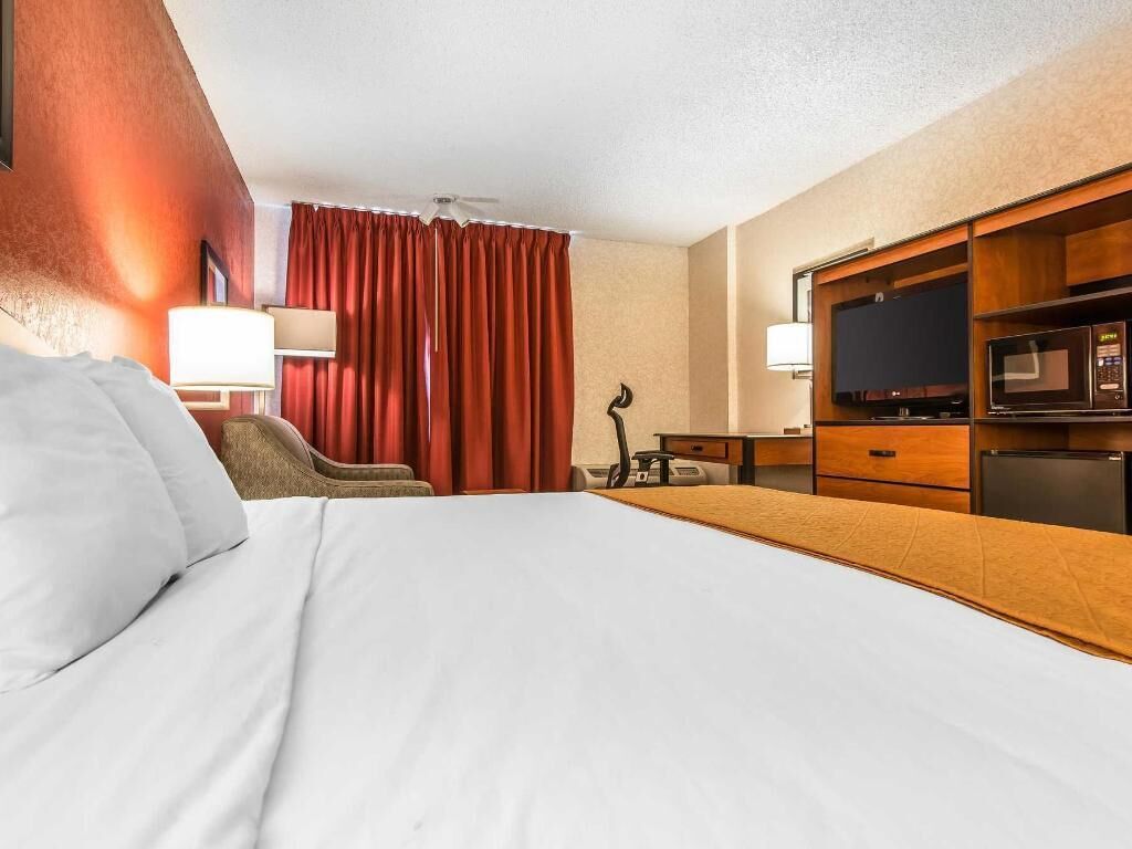 Desk, laptop workspace, blackout curtains, iron/ironing board