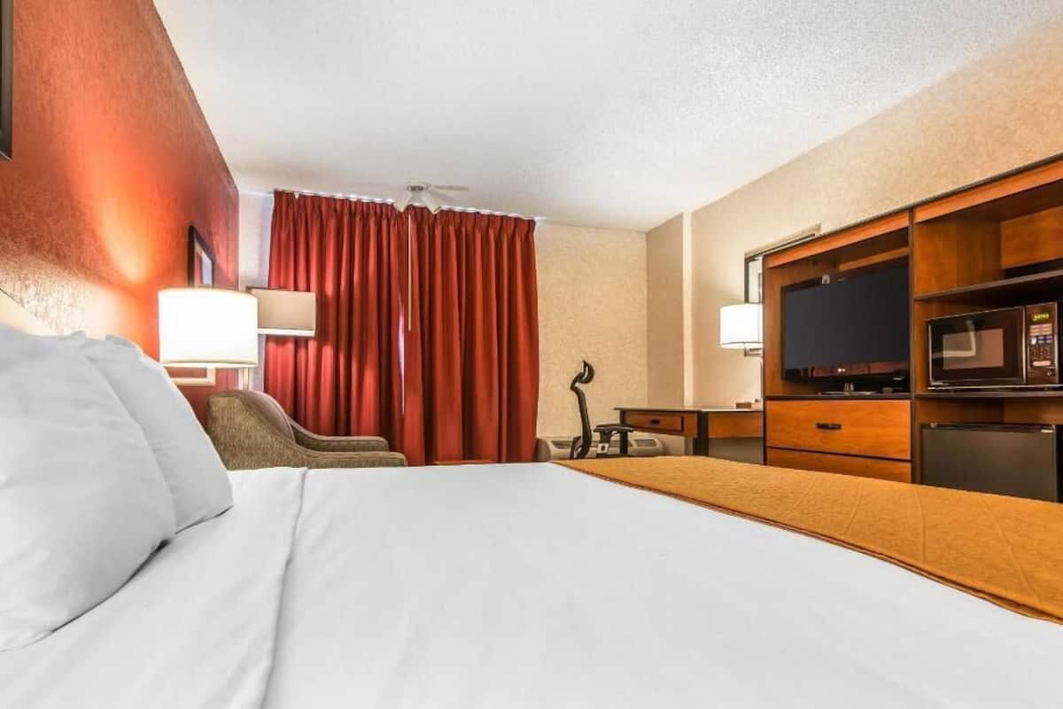 Desk, laptop workspace, blackout curtains, iron/ironing board