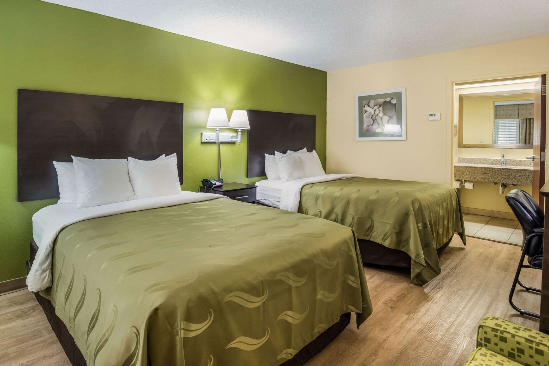 Premium bedding, Select Comfort beds, desk, laptop workspace