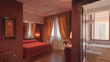 Superior Double or Twin Room | Minibar, in-room safe, desk, blackout drapes