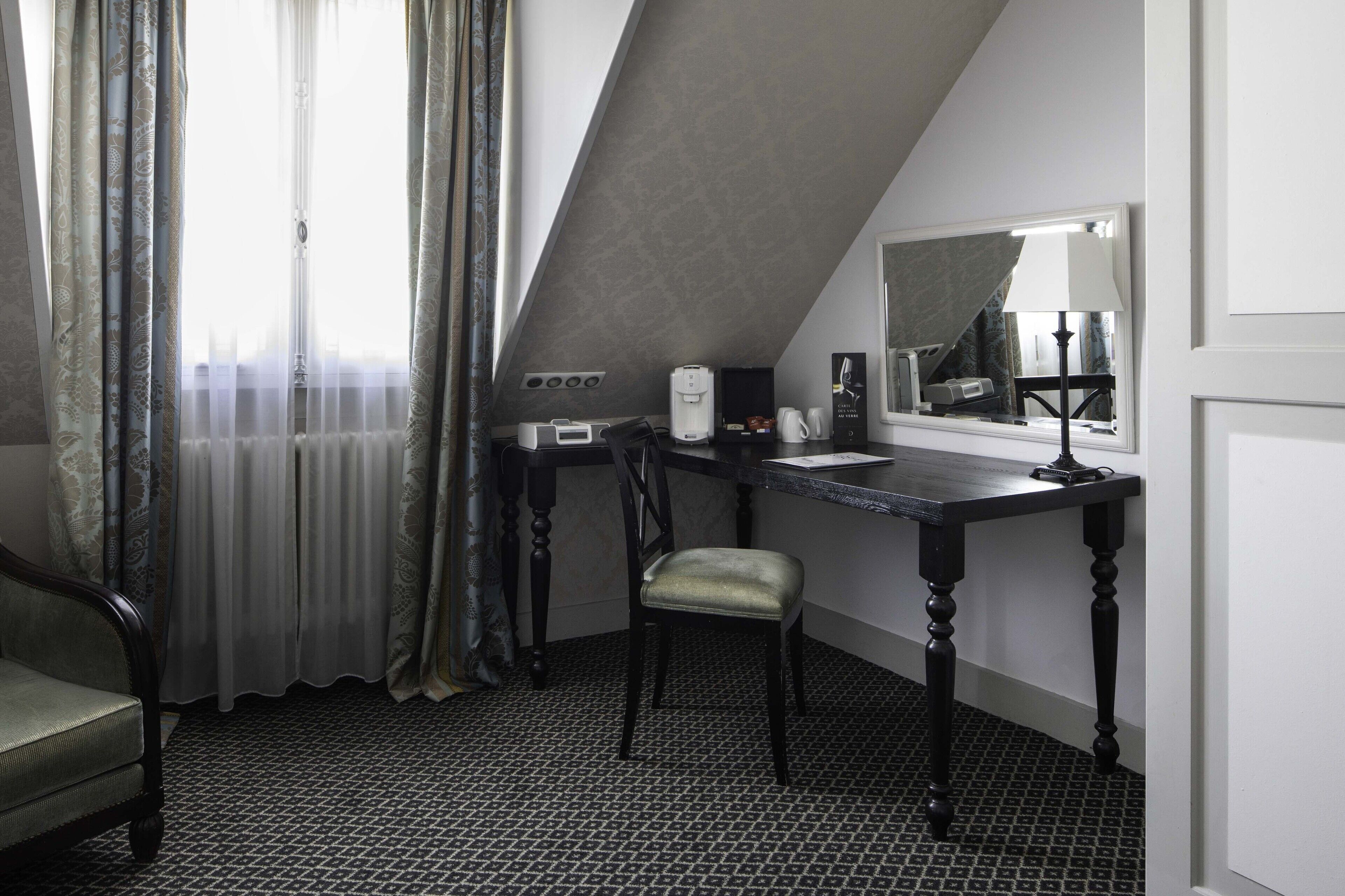 triple room - complimentary soft minibar, courtesy tray, chromecast - snacks and digital press | minibar, in-room safe, desk, blackout curtains