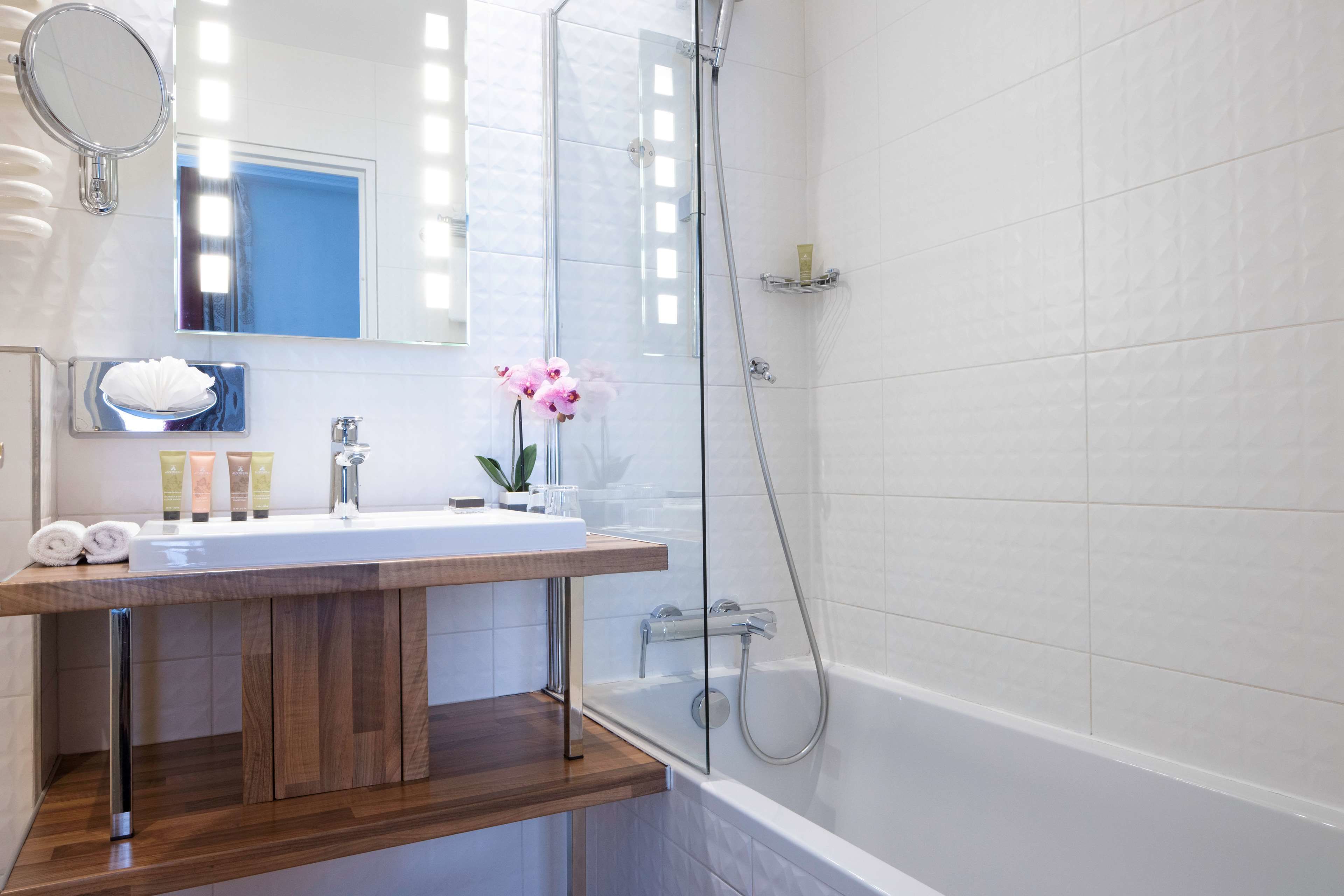 standard double room - complimentary soft minibar, courtesy tray, chromecast - snacks, digital press | bathroom | free toiletries, hair dryer, bathrobes, slippers