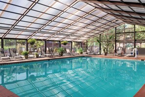 Indoor pool, open 6:00 AM to 10:00 PM, pool loungers