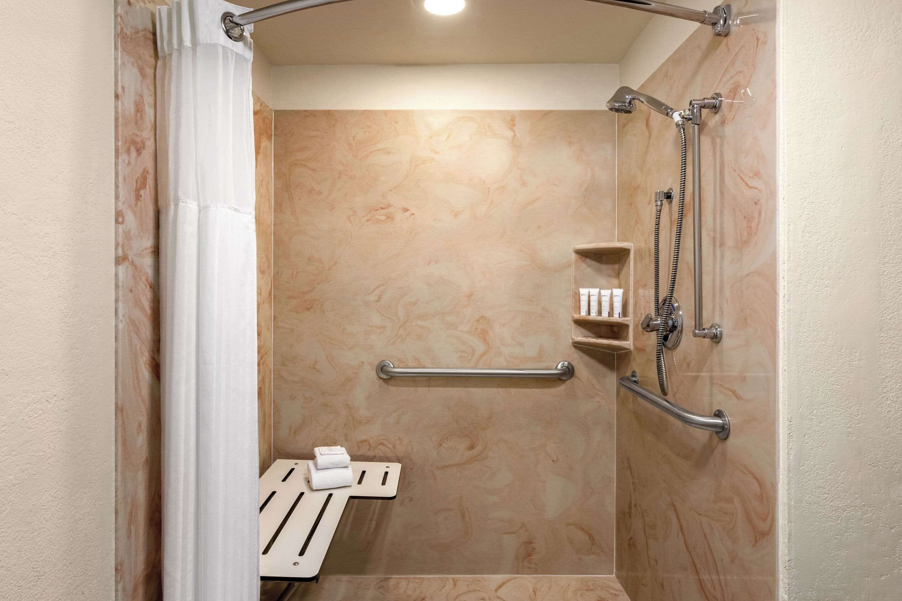 room, 1 king bed, accessible, non smoking (roll-in shower) | premium bedding, pillow-top beds, in-room safe, desk