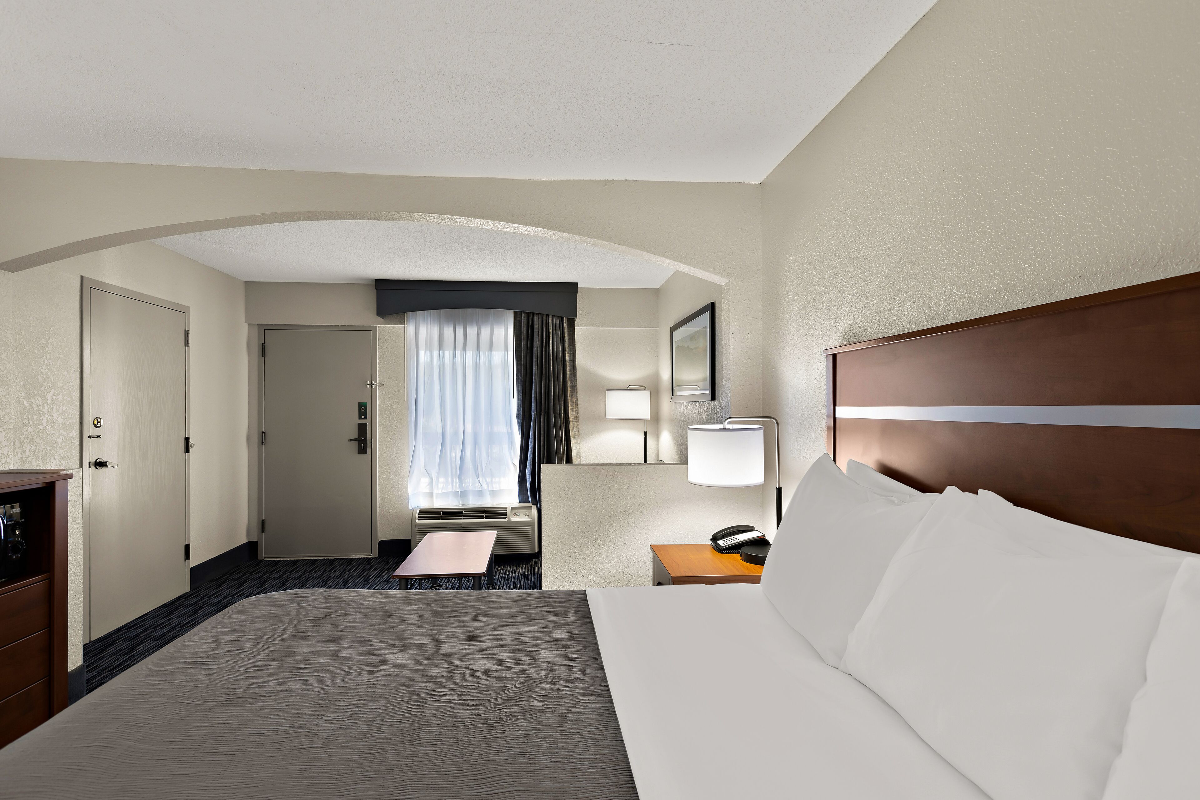 desk, laptop workspace, blackout curtains, iron/ironing board